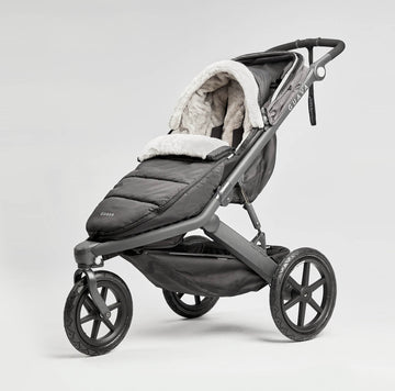 slightly unzipped side angle view of the Roam Performance Footmuff